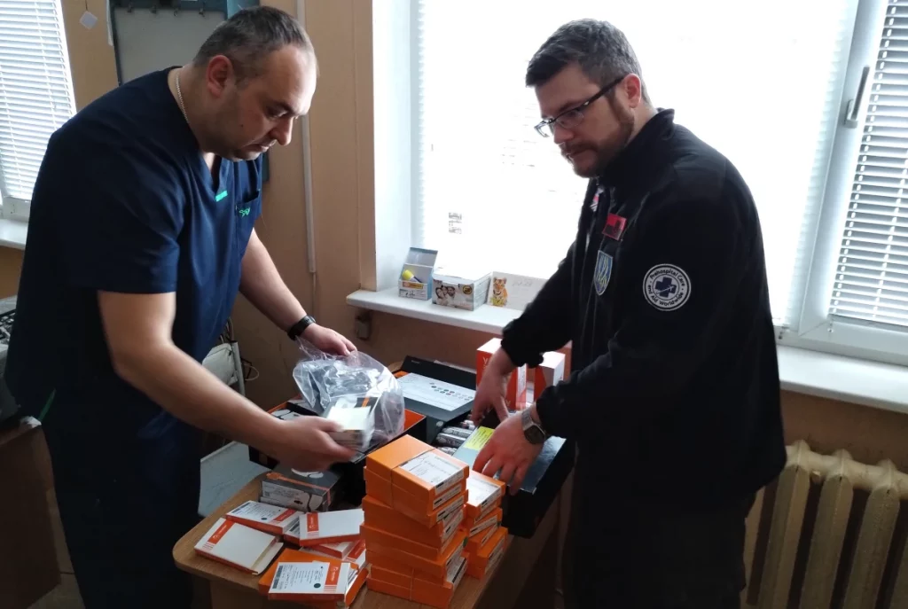 Oleg Dmitriev, Sunflower Scotland, delivering a donation of orthopaedic screws to Dr Sudakov at Kharkiv Regional Trauma Hospital
