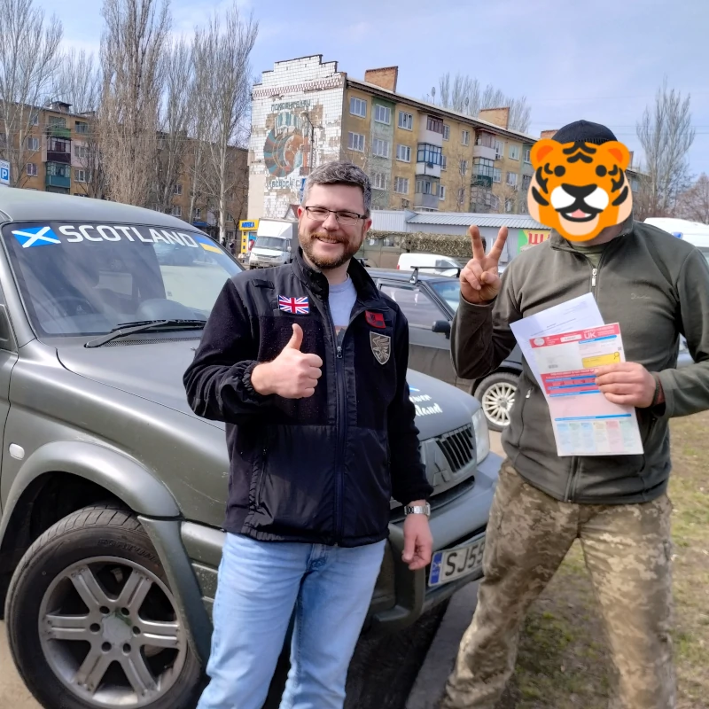 Oleg Dmitriev, chairman of Sunflower Scotland, delivering 4x4 truck to a Ukrainian soldier in Kostyantynivka, 22 March 2023