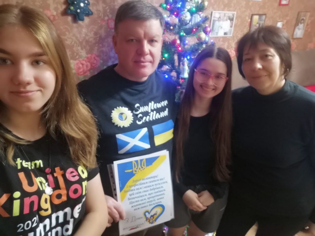 Vitaliy Sunflower Scotland's volunteer delivering aid to a fostering family in Kharkiv Region