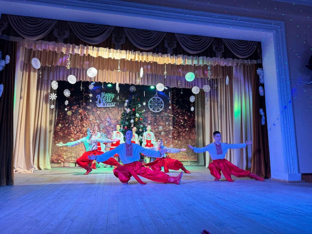 Actors performing a Ukrainian national dance for children at a concert organised by charities Sunflower Scotland (UK) and Shira Sprava (Ukraine) in Kryvyi Rih