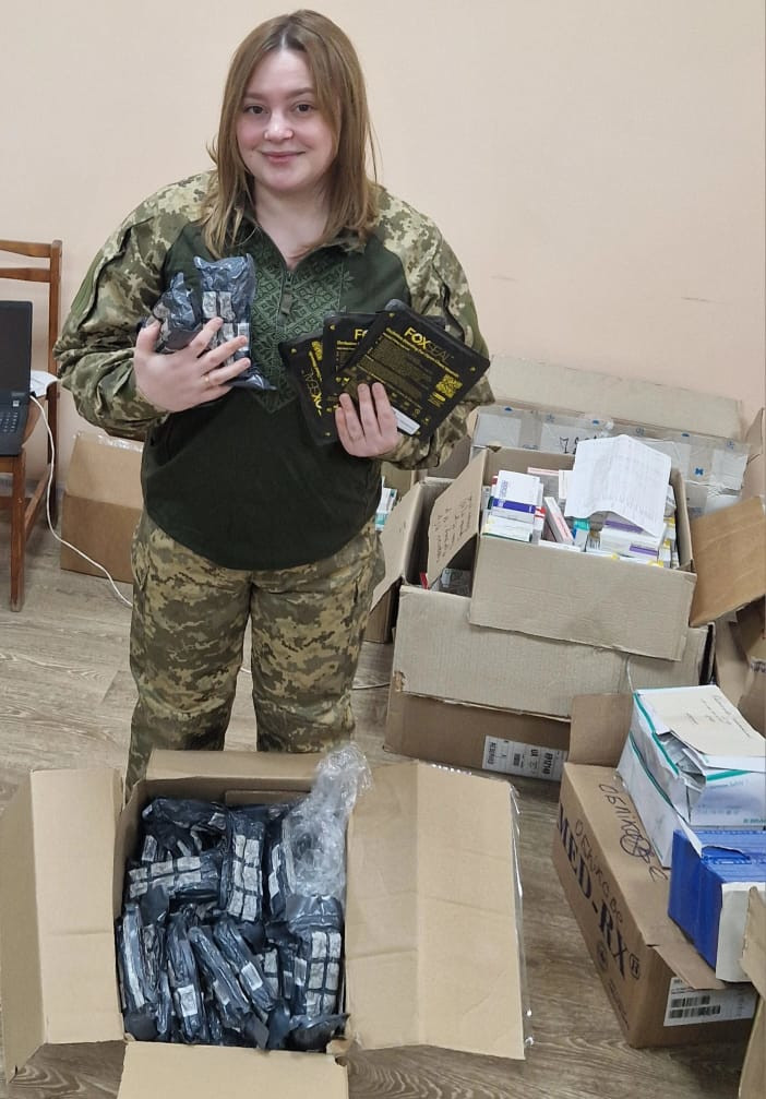 Ukrainian defence medic with israeli bandages and occlusive dressings delivered by Sunflower Scotland