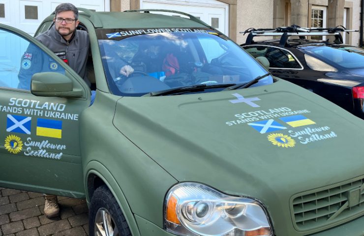 Oleg Dmitriev, chairman of Sunflower Scotland, in Volvo donated by Barclay to 129th brigade TRO