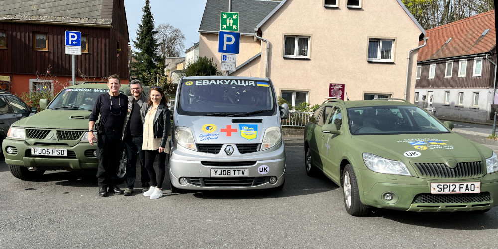 Sunflower Scotland volunteers Mark MacCarley, Oleg Dmitriev, Elvira Dmitrieva, driving cars to Ukraine