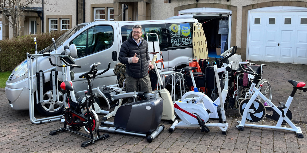 Oleg Dmitriev, chairman of Sunflower Scotland in Edinburgh, with exercise machines for rehabilitation donated by Scotland, before trip to Ukraine