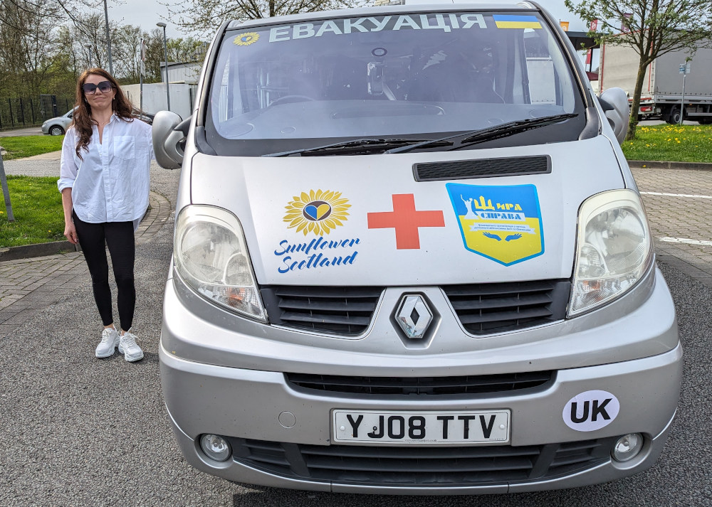 Elvira Dmitrieva, treasurer of Sunflower Scotland, driving the Renaul Trafic van for patient transport to Ukraine