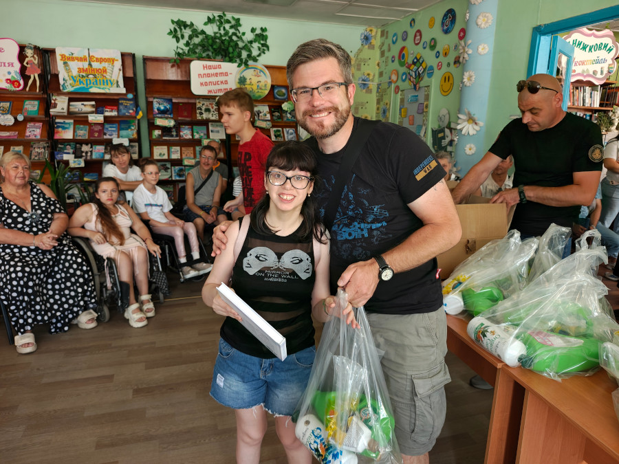 Sunflower donates cleaning supplies and colouring books to disabled children