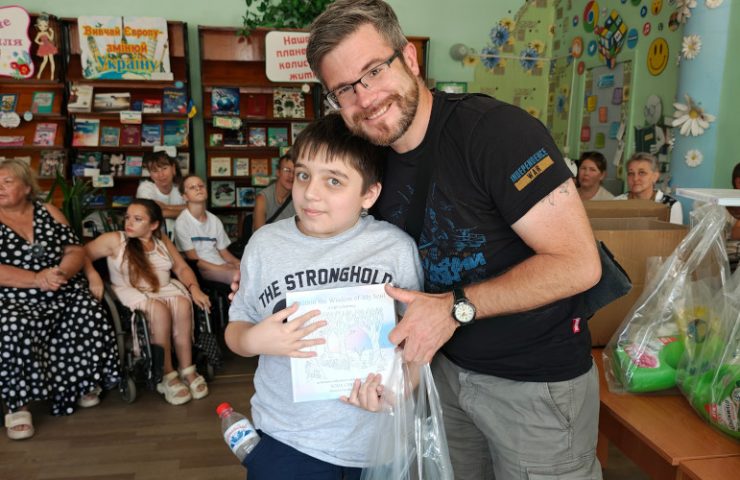 Sunflower donates cleaning supplies and colouring books to disabled children