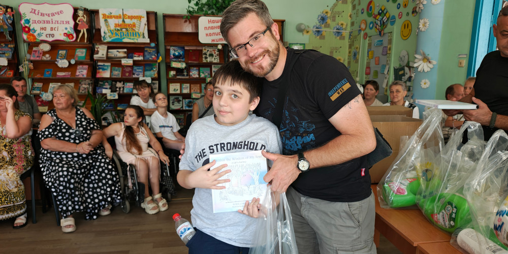 Sunflower donates cleaning supplies and colouring books to disabled children