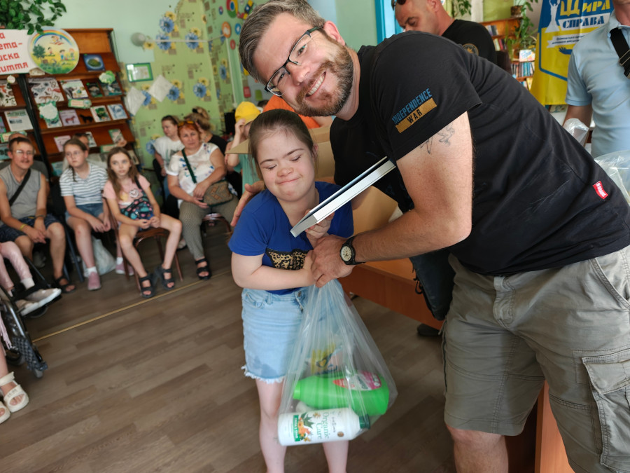 Sunflower donates cleaning supplies and colouring books to disabled children