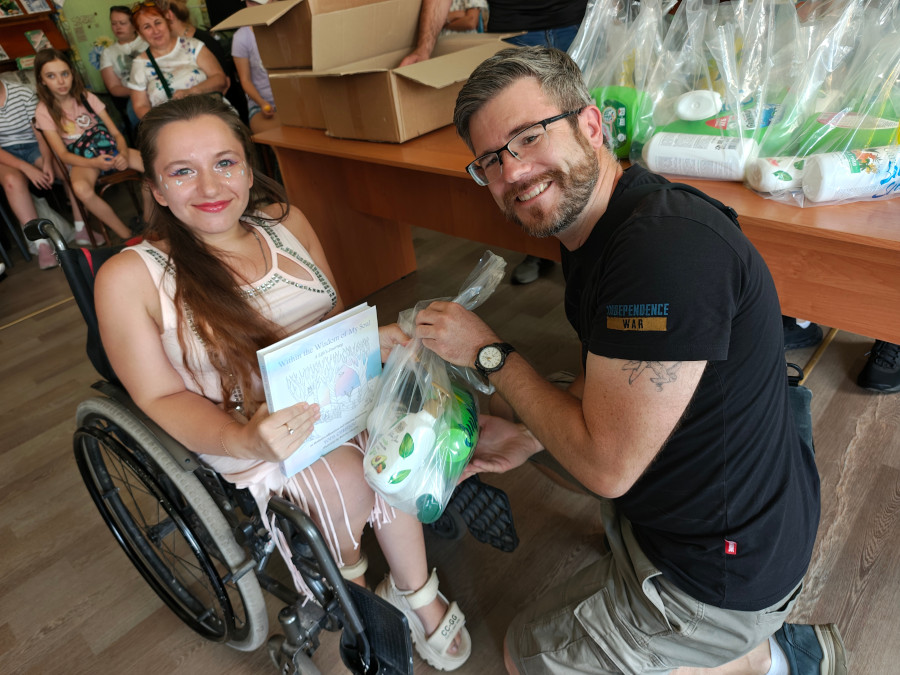 Sunflower donates cleaning supplies and colouring books to disabled children