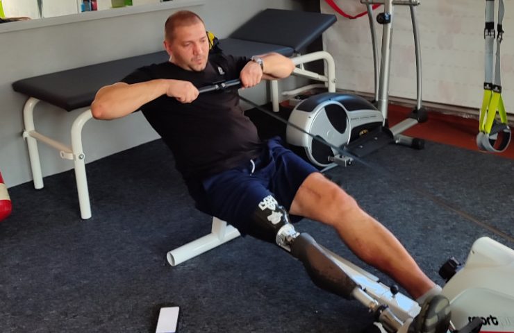 Ukrainian Paralympian Oleksandr Andriienko training on rowing machine from Scotland