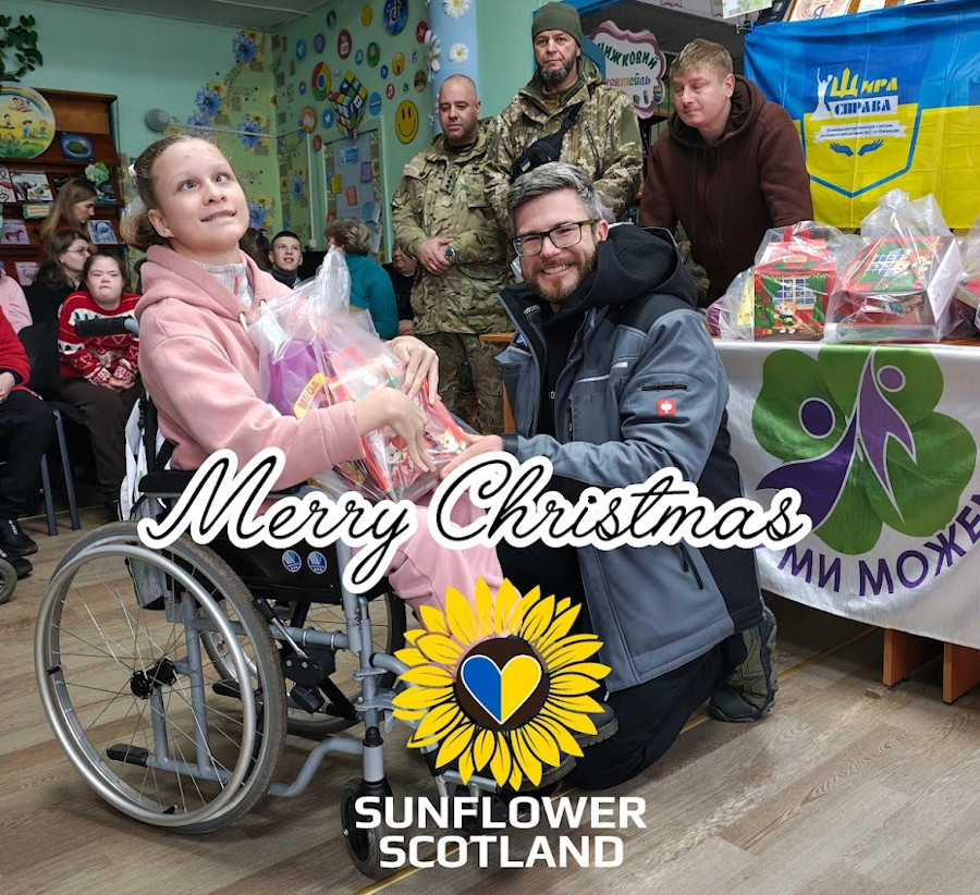 Merry Christmas poster, Sunflower Scotland giving gifts to children with special needs in Kryvyi Rih