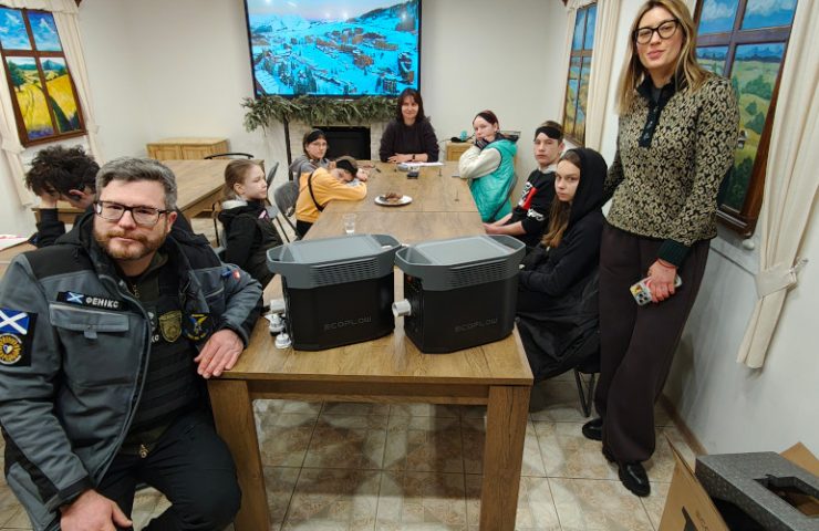 Oleg, Oleksandra and children in the KRYLA art hub and shelter, Kherson city