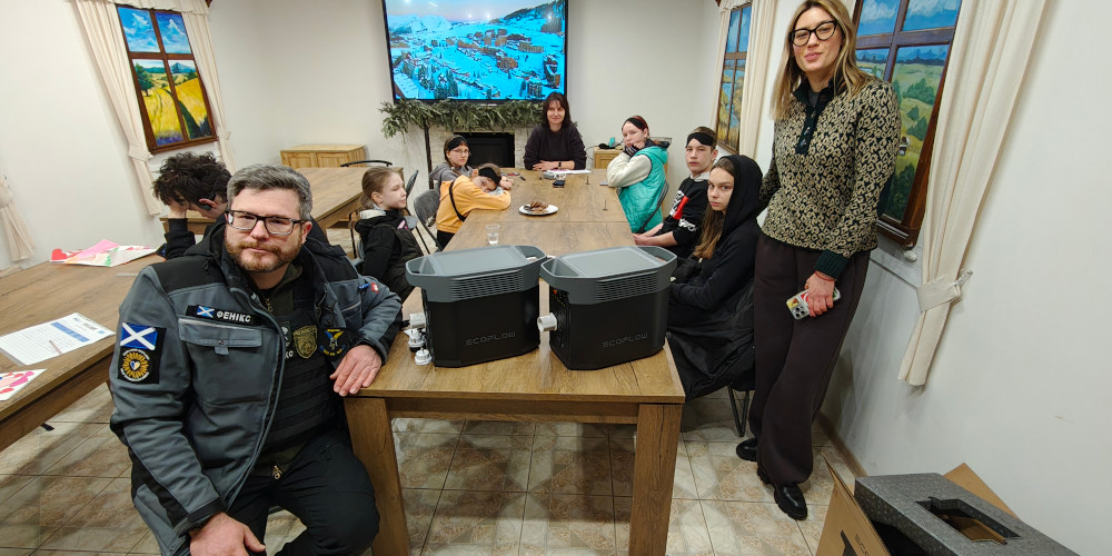 Oleg, Oleksandra and children in the KRYLA art hub and shelter, Kherson city