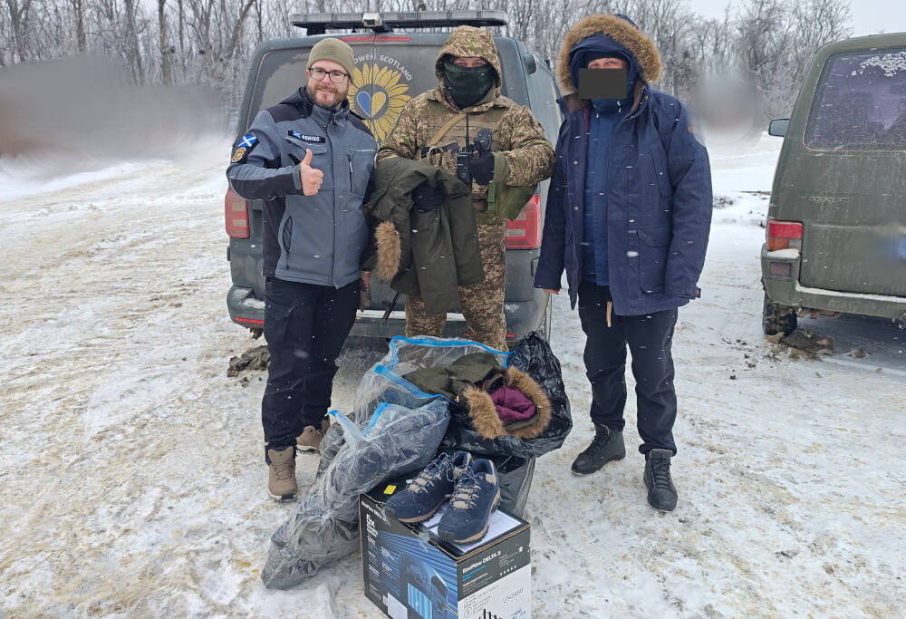 Ukrainian officers in jackets by Hoggs of Fife, Dolyna checkpoint, Donbas