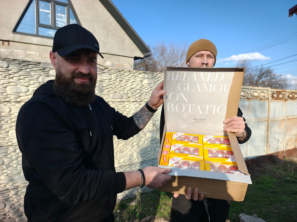 36th Marines holding a box of Tunnocks Teacakes from Scotland