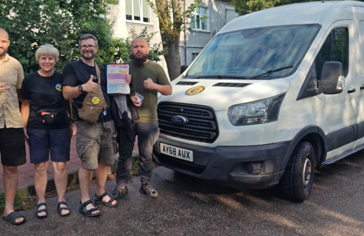 Alison and Oleg of Sunflower Scotland donating Ford Transit van to medics in a field hospital near Zaporizhzhia