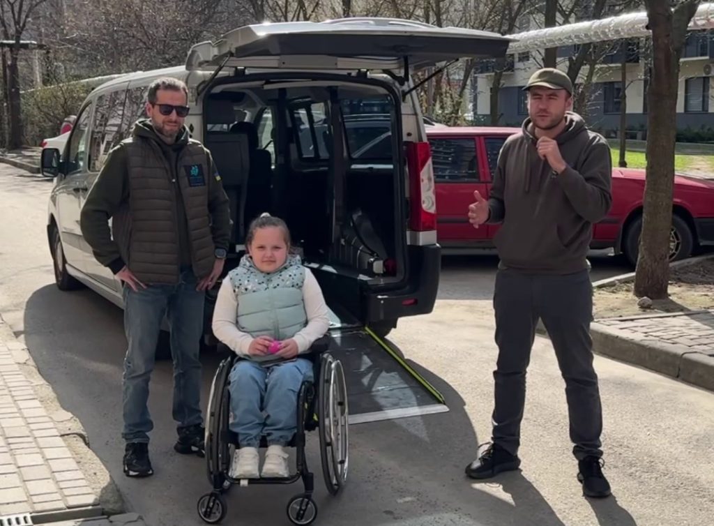 Peugeot Wheelchair van donated by Sunflower Scotland to Way to Health used to transport girl in wheelchair for rehabilitation