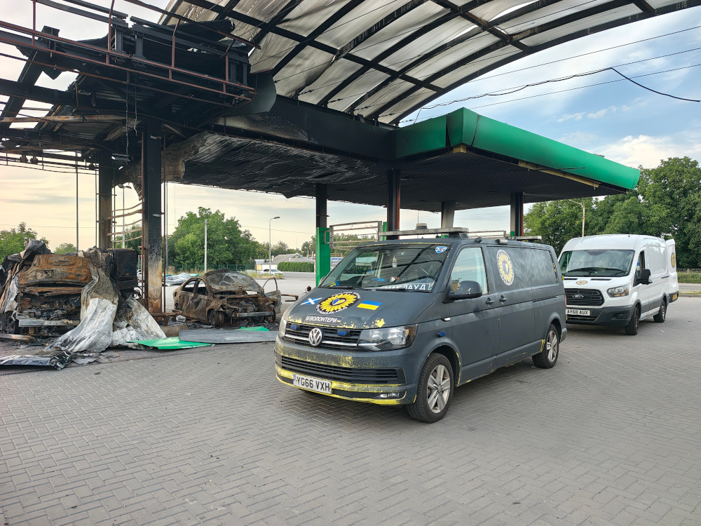 Sunflower Scotland's convoy at destroyed WOG petrol station in Pavlohrad