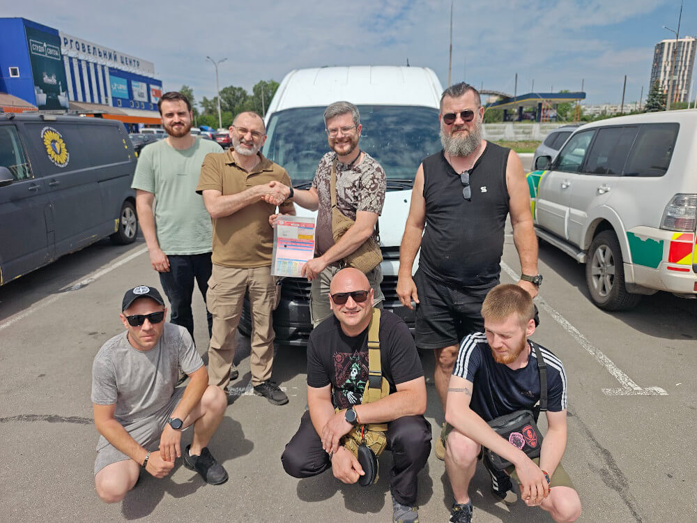 Medics of 253 Assault Regiment receiving Arei Ford Transit van from Sunflower Scotland